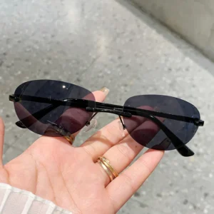 Hot Selling Popular New Men’s and Women’s Outdoor UV400 Sunscreen Ultra light Rimless Metal Oval Sunglasses with Cut edge Design