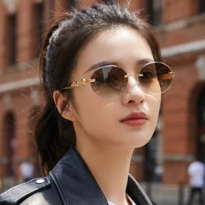 New Arrivals Manufacturer Stylish Oval Frameless Sunglasses for Women